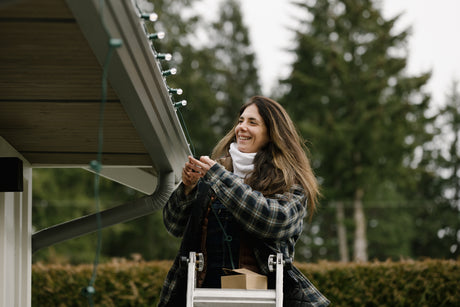 Woman hangs G30 Christmas Lights to her roofline