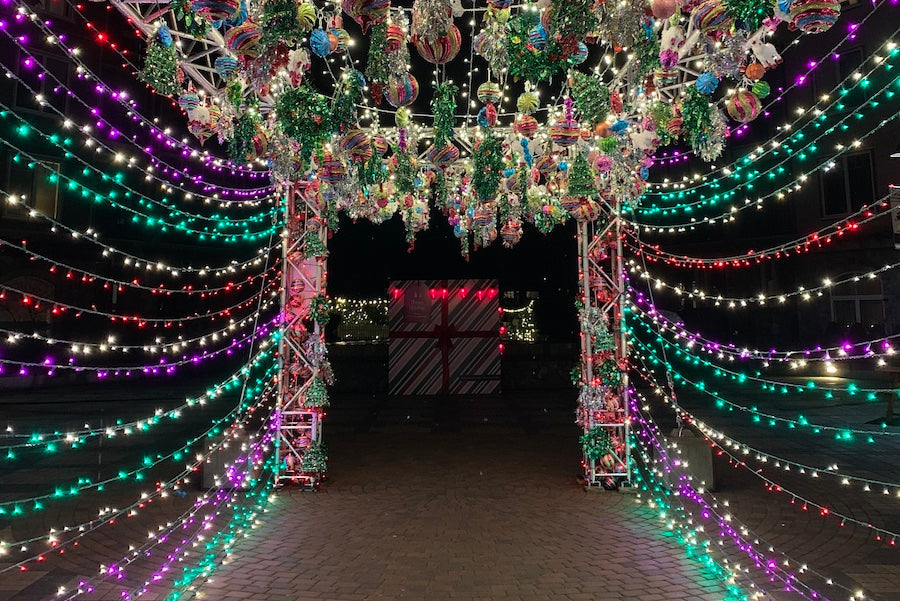 Purple, green, red, and white light tunnel