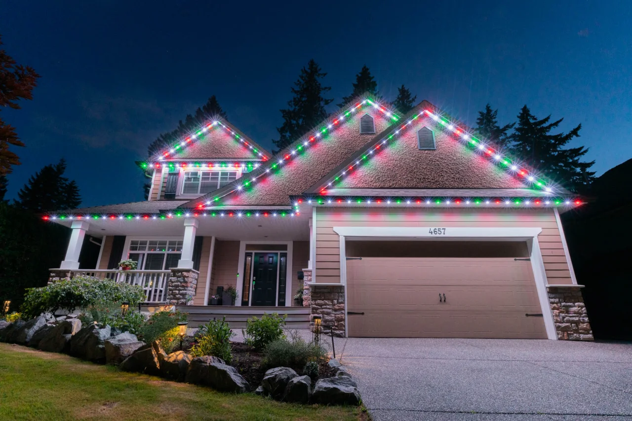 Blue Chromaglow lighting outlining a home at night